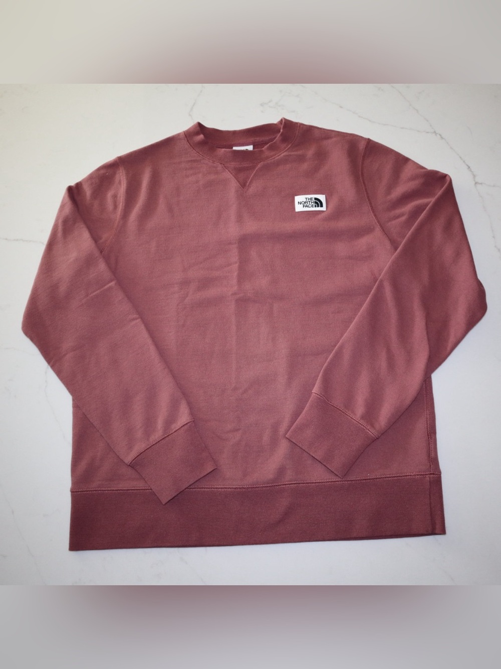 The North Face women’s Crewneck Sweater in Dusty Rose